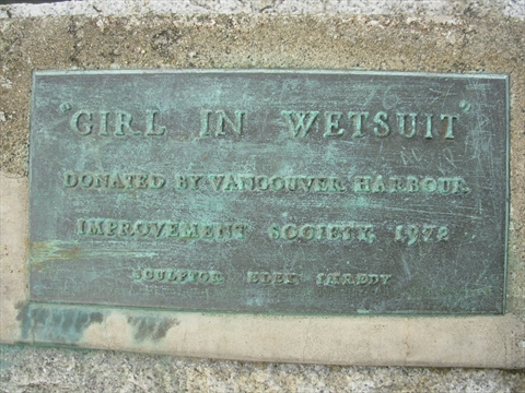Girl in Wetsuit Statue plaque in Stanley Park, Vancouver, BC, Canada