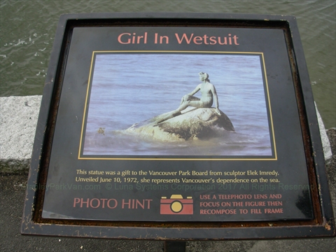 Girl in Wetsuit Statue plaque in Stanley Park, Vancouver, BC, Canada
