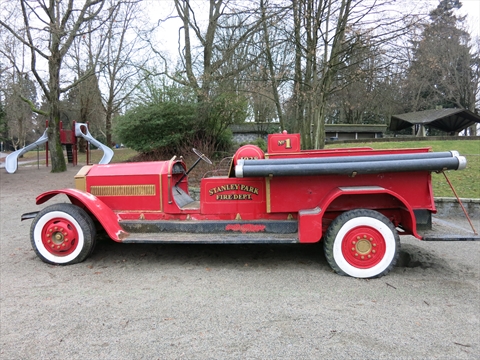 old fire truck at Ceperley Field playground in Stanley Park, Vancouver, BC, Canada