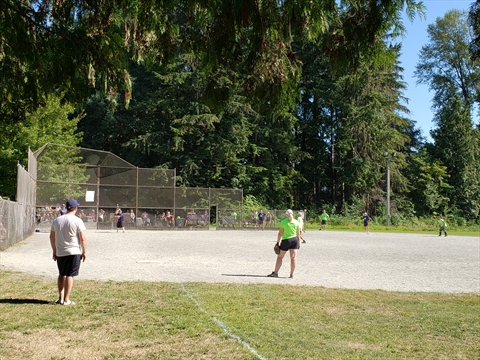 Softball being played in Stanley Park, Vancouver, BC, Canada