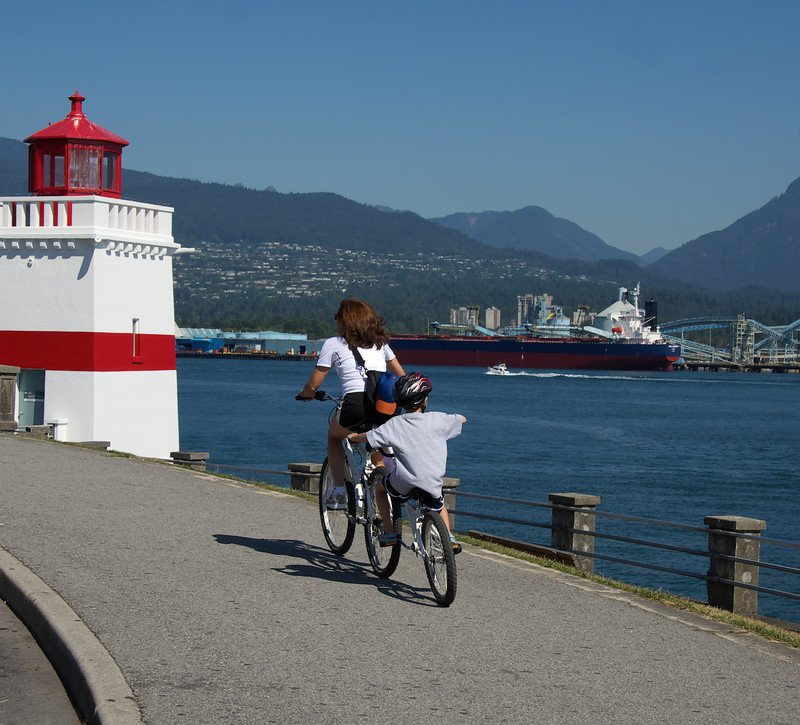 Cycling on Stanley Park Seawall in Stanley Park, Vancouver, BC, Canada