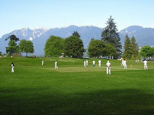 Cricket being played in Stanley Park, Vancouver, BC, Canada
