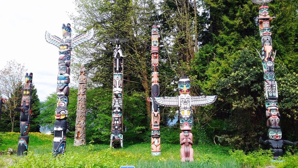 Totem Poles and Welcome Gateway in Stanley Park, Vancouver, BC, Canada