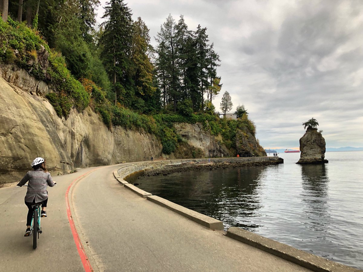 Cycling on Stanley Park Seawall in Stanley Park, Vancouver, BC, Canada