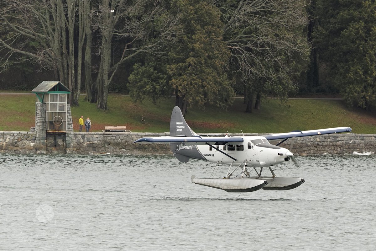 Seaplane landing in Coal Harbour, Vancouver, BC, Canada